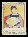 CIRCA 1973: The stamp depicts the painting Ã¢â¬ÅGirl with a FanÃ¢â¬Â by Renoir, State Hermitage Museum, Leningrad